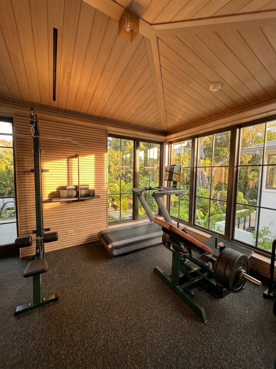 Jupiter Island Estate gym — window wall and treadmill