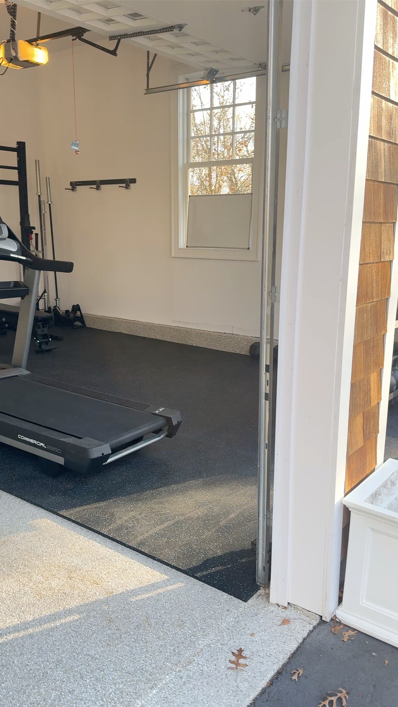 Oyster Bay Cove garage gym cardio and training area